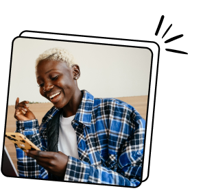 A person smiling while checking their phone